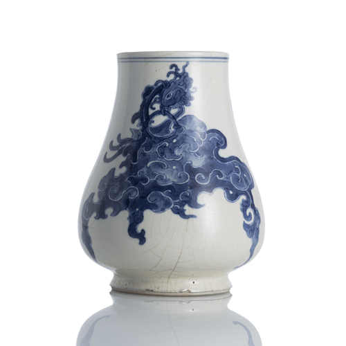 <b>A rare biscuit porcelain vase with underglaze blue decoration of a pair of phoenixes and two seals</b>