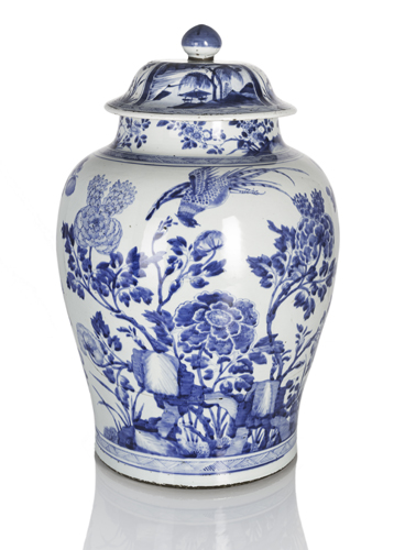 <b>A pair of large porcelain jars and covers with underglaze-blue bird and floral decoration</b>