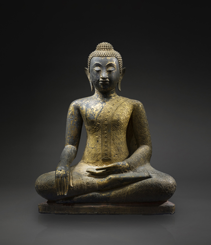 <b>A GILT- AND BLACK-LACQUERED BRONZE FIGURE OF BUDDHA SHAKYAMUNI</b>