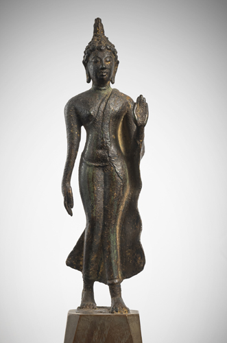<b>A BRONZE FIGURE OF THE WALKING BUDDHA</b>