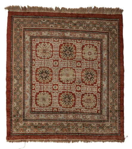 <b>A RARE SQUARE KHOTAN SILK SEAT MAT</b>