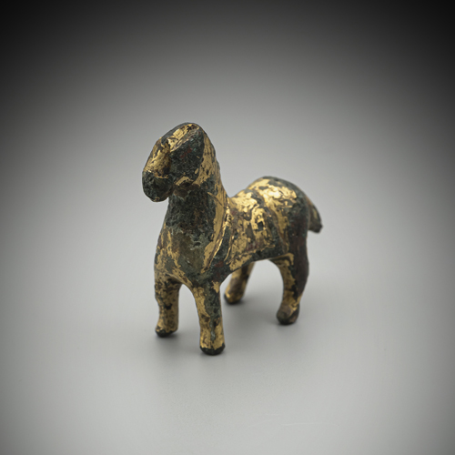 <b>A MINIATURE GILT-BRONZE MODEL OF A HORSE</b>