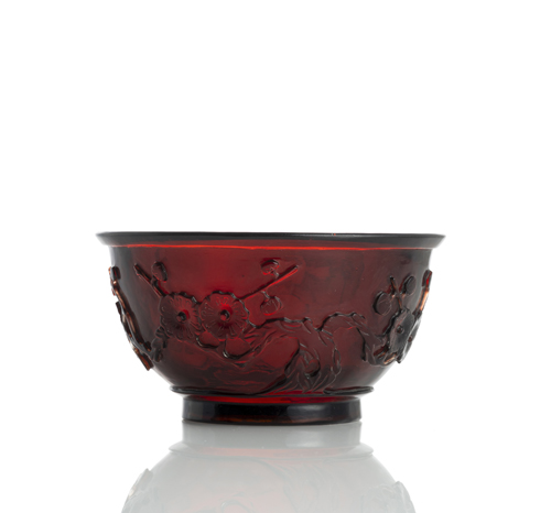 <b>An Imperial ruby red Beijing glass bowl with plum blossom branches in relief</b>