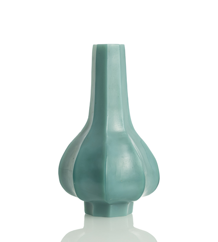 <b>An opaque turquoise coloured glass vase</b>