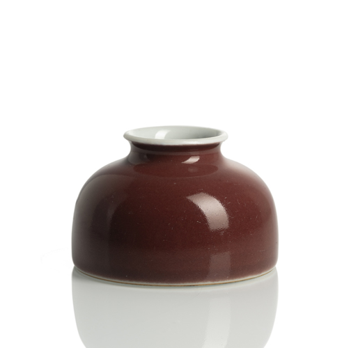 <b>AN EXTREMELY RARE COPPER-RED GLAZED BRUSHWASHER MARKED TANG YING (1682-1756)</b>