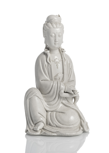 <b>A 'blanc de chine' figure of a seated Guanyin</b>