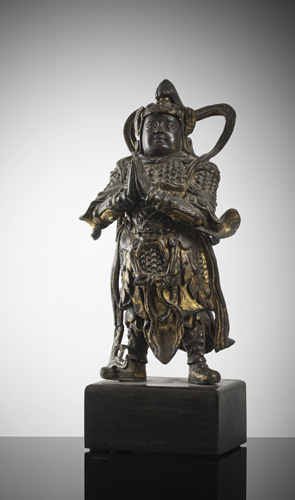 <b>A BRONZE FIGURE OF A GUARDIAN</b>