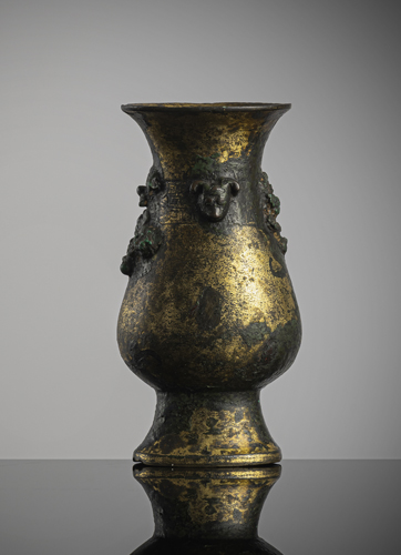 <b>A part-gilt bronze in the shape of a 'zhi'</b>