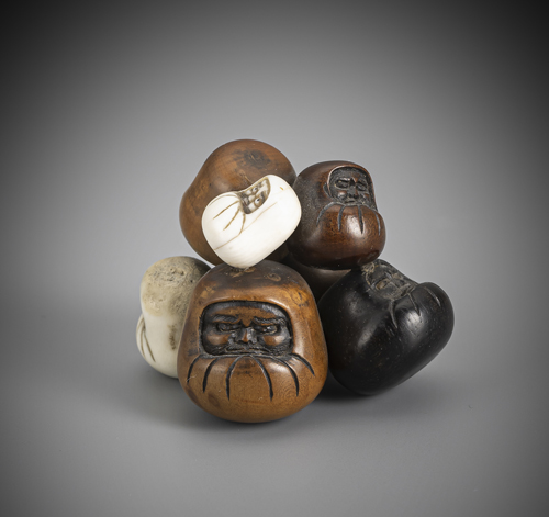 <b>Unusual netsuke formed from a group of seven Daruma dolls</b>