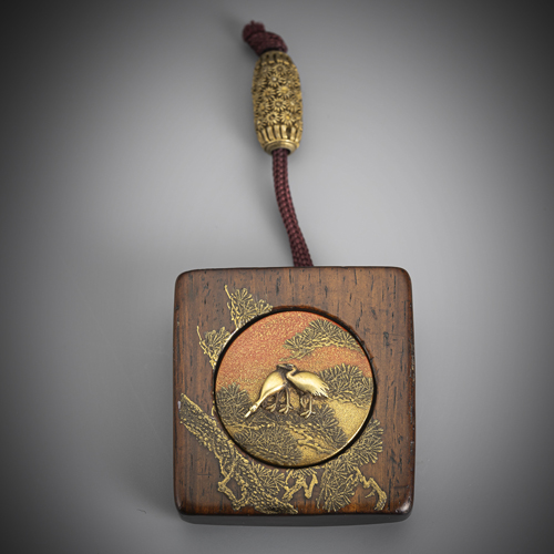 <b>A fine kagamibuta with chrysanthemum ojime</b>