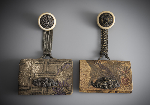 <b>Two tobacco pouches made of leather or embroidered textile background</b>
