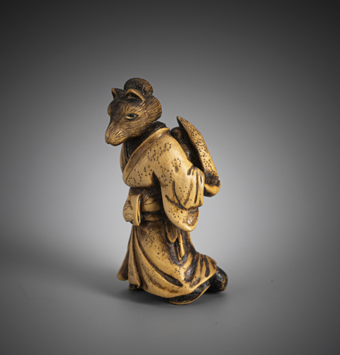 <b>A netsuke the fox Kuzonoha with a baby on her back</b>