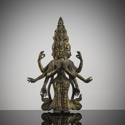 <b>A GILT-BRONZE FIGURE OF EKADASHALOKESHVARA</b>