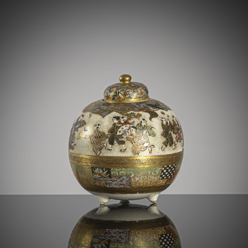 <b>A small satsuma jar and cover with decoration of children playing on three short legs</b>