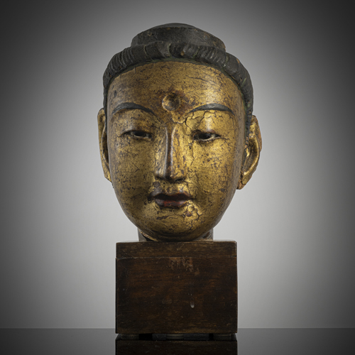<b>A gilt- and black-lacquered clay head of Guanyin</b>