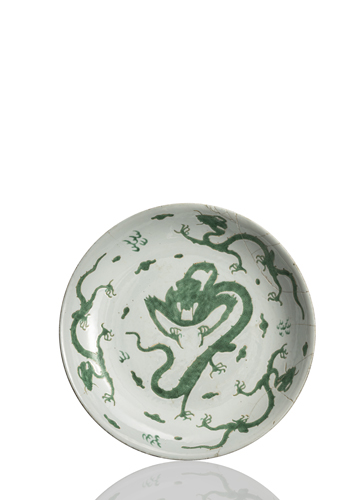 <b>A porcelain charger decorated with four green dragons</b>
