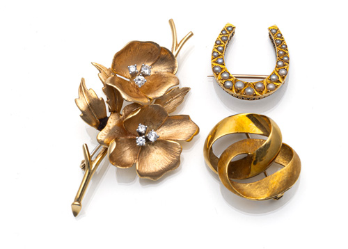 <b>Konvolut aus Goldbroschen</b>