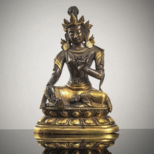 <b>A PARCEL GILT-BRONZE FIGURE OF SYAMATARA</b>