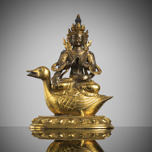 <b>A PARCEL GILT-BRONZE FIGURE OF PROBABLY AGNI</b>
