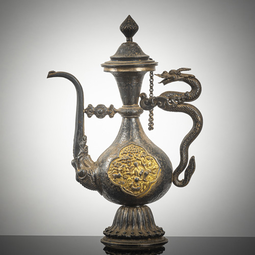 <b>A PARCEL GILT-COPPER AND SILVER EWER</b>