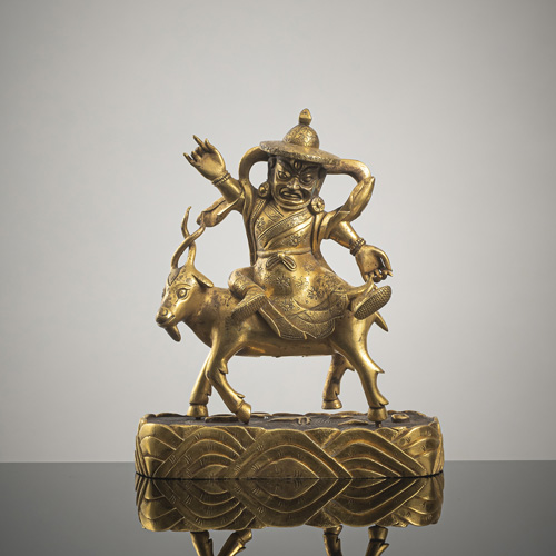 <b>A GILT-BRONZE FIGURE OF A DAM CAN</b>