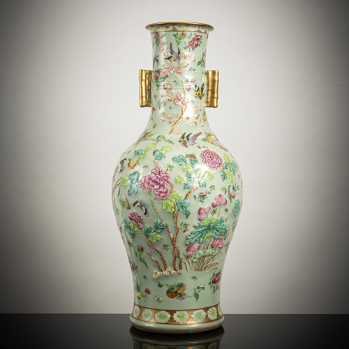 <b>A large porcelain vase with 'famille rose' relief decoration of flowers, birds and insects on a celadon ground</b> <b>A large porcelain vase with 'famille rose' relief decoration of flowers, birds and insects on a celadon ground</b>