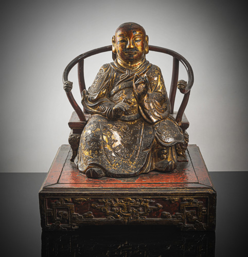 <b>A GILT- AND RED-LACQUERED BRONZE FIGURE OF A DIGNITARY</b>