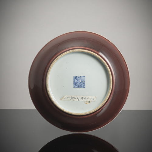 <b>A copper-red porcelain saucer</b>