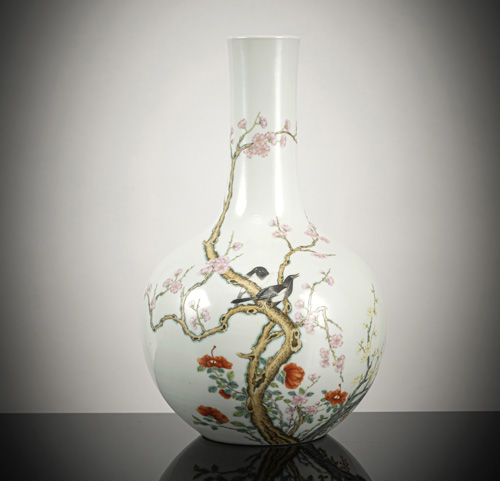 <b>A 'famille rose' magpies on prunus branches porcelain bottle vase</b> <b>A 'famille rose' magpies on prunus branches porcelain bottle vase</b>