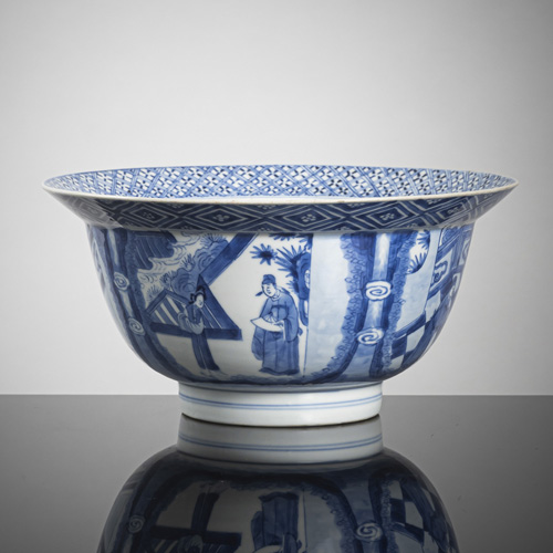 <b>A porcelain bowl decorated in underglaze blue with figural romance scenes in reserves</b>