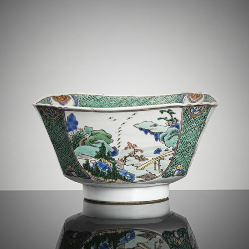 <b>An octagonal 'Famille verte' porcelain bowl with seascapes and figurative decoration, partly with gold</b>