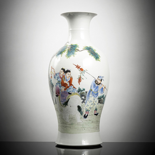 <b>A porcelain vase with two boys on a white elephant and immortals in the colours of the 'Famille rose'</b> <b>A porcelain vase with two boys on a white elephant and immortals in the colours of the 'Famille rose'</b>