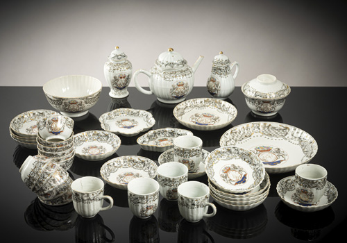 <b>A partial armorial porcelain service</b> <b>A partial armorial porcelain service</b>