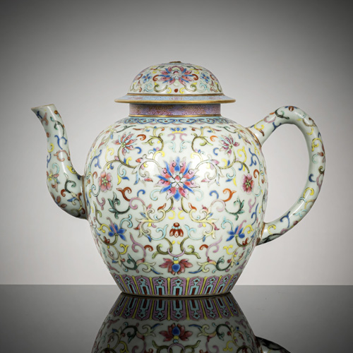 <b>A rare and fine 'Famille rose' teapot with lotus decoration and foliage</b> <b>A rare and fine 'Famille rose' teapot with lotus decoration and foliage</b>