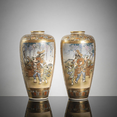 <b>A pair of Satsuma vases with fine decoration of scenes with beautiful couples, children in gardens, framed by a dense floral pattern</b>