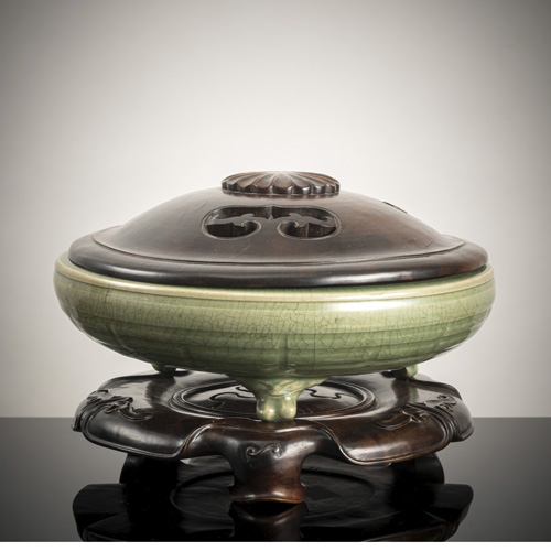<b>A large tripod celadon censer with low-relief trigram decoration</b>