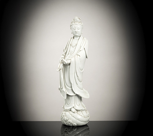 <b>A 'blanc de chine'-figure of Guanyin standing on waves</b>