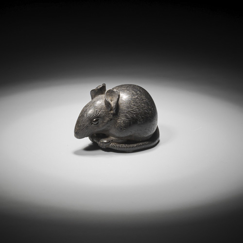 <b>A fine carved near black wood netsuke of a rat</b>