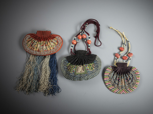 <b>Three fragrance pendants with flowers and the symbol for long life</b>