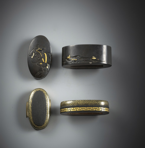 <b>Two fuchi-kashira from shakudô</b>