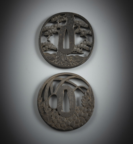 <b>Two almost round tsuba made of iron</b>