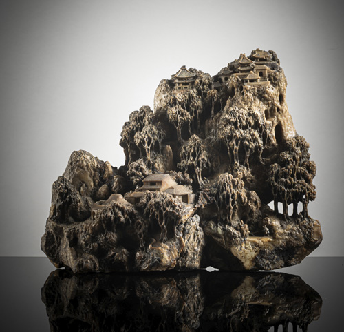 <b>A large soapstone rock with temple complex and watercourse</b>