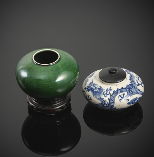 <b>A group of two porcelain brush washers, one with underglaze blue dragon decoration and one with emerald green monochrome glaze</b>