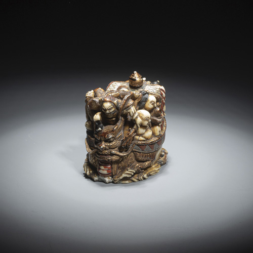 <b>An ivory netsuke of the Seven Gods of Fortune (Shichifukujin) on a dragon boat</b>