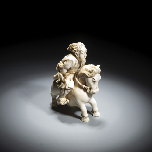 <b>An ivory okimono of a warrior on a horsback</b>