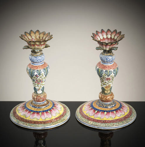 <b>A pair of very rare candlesticks after a European Baroque model in Canton enamel</b>