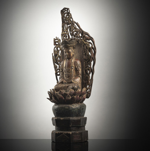 <b>A GILT- AND RED-LACQUERED WOOD FIGURE OF PROBABLY GUANYIN</b>