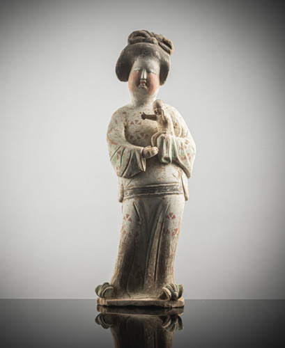 <b>An earthenware figure of a 