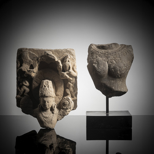 <b>A SANDSTONE FRAGMENT OF PROBABLY SURYA AND A </b>