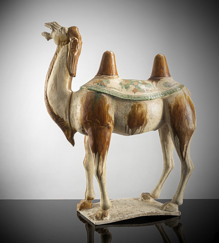 <b>A large 'sancai'-glazed earthenware figure of a Bactrian camel</b>